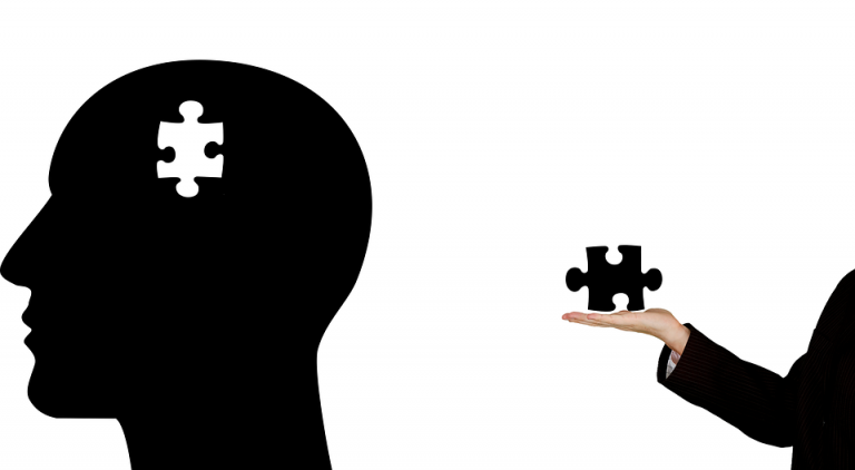 puzzle piece out of a mans brain wow