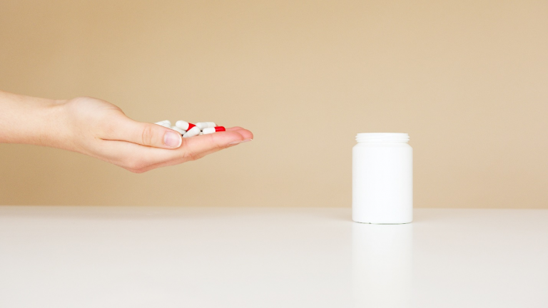 Person holding prescription drugs