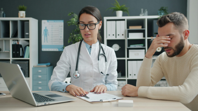 Worried patient waiting at pharmacy counter due to prescription delay
