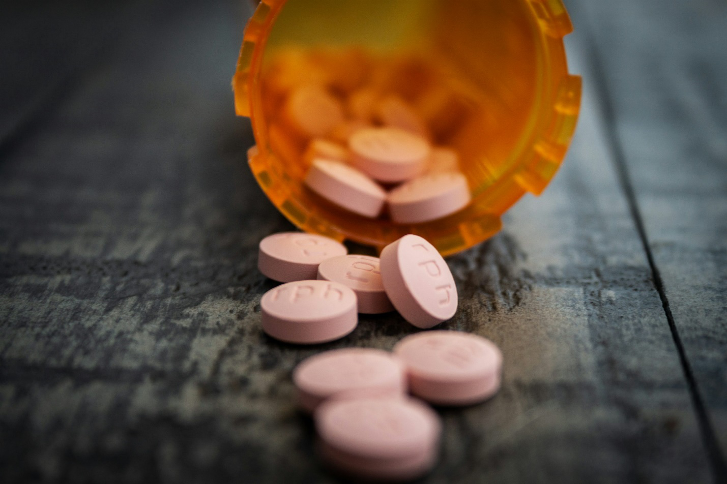 Pill container with organized daily medication doses on a table